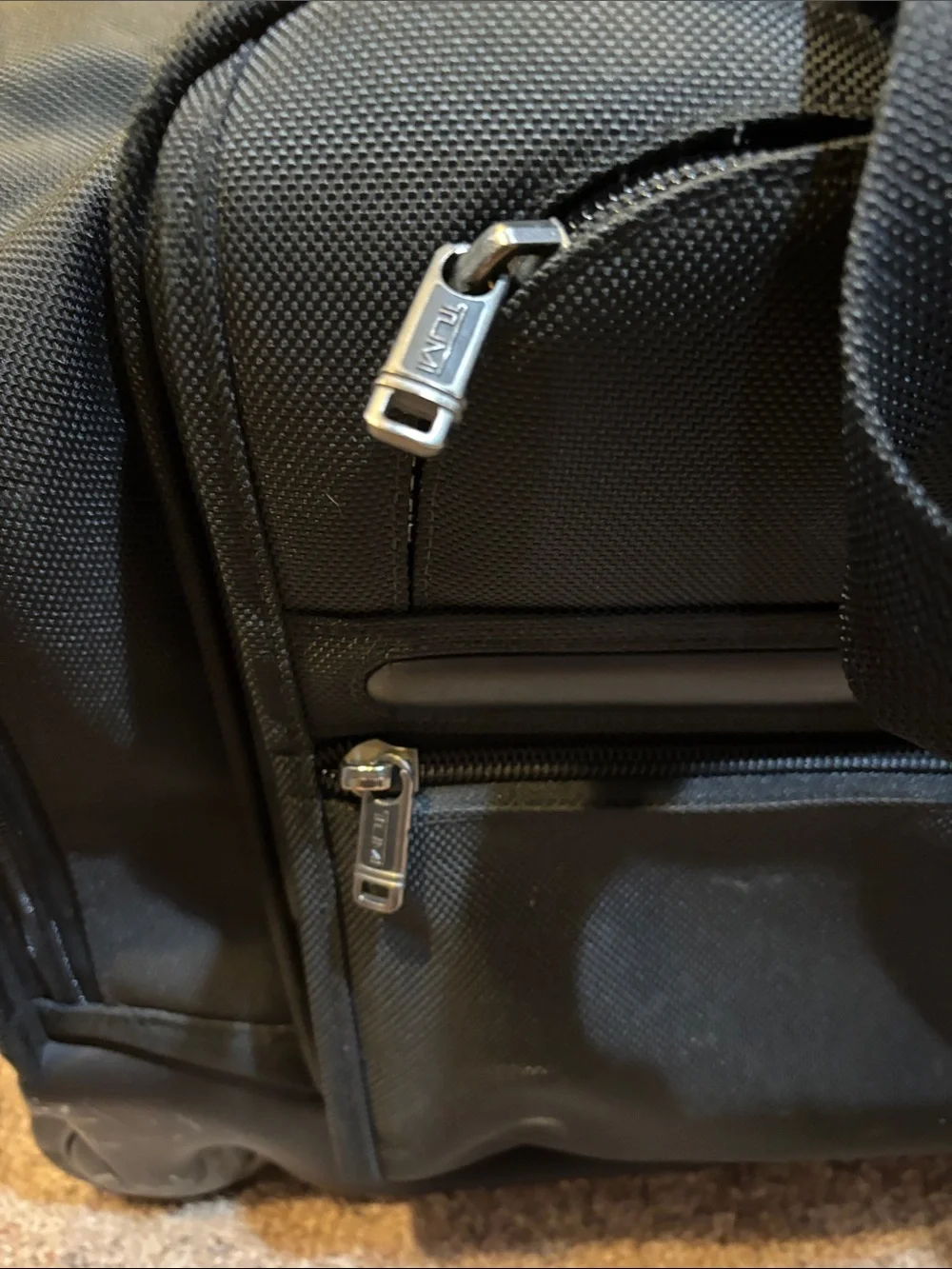 Tumi Black Rolling Carry-On Duffel with Wheels and handle
